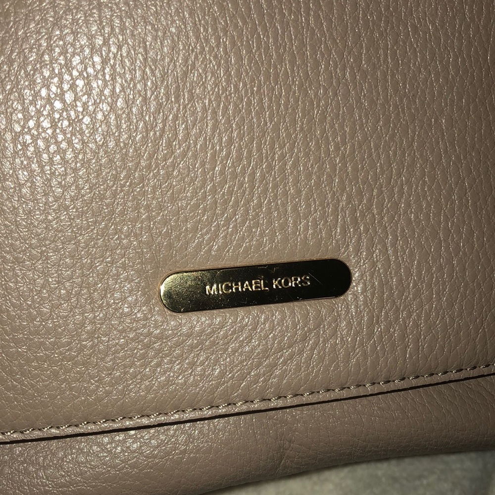 Michael Kors light brown clutch bag